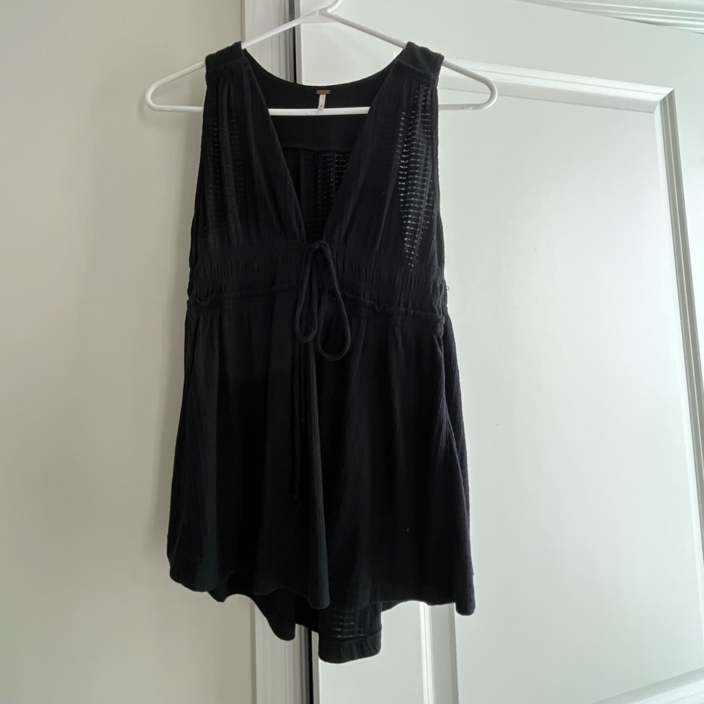 Free People top size Small. Good condition. Smoke free pet free home